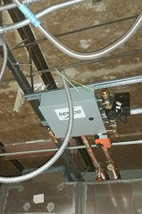 An installed NEUTON controllable chilled beam pump module allows zoned control of up to 10 chilled beams. Photo Credit (all): Provided by SEMCO