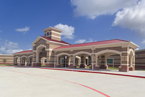 A new student drop off area creates a welcoming entry environment to the new Alamo Elementary School in Baytown.